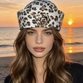 Vintage leopard print pillbox hat featuring floral detail and decorative studs - M (56-58cm) / Off-white Leopard Flower
