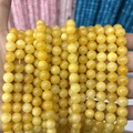 Vibrant yellow chalcedony round beads for DIY jewelry making and handmade crafts - A453 Chalcedony - Golden Yellow