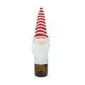 Close-up of Christmas gnome wine bottle cover with red striped knitted hat and white beard - Red & White Stripes Style