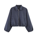 Detail of navy blue polka dot jacket featuring metal zipper and ribbed cuffs - Navy Blue Polka Dots
