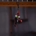 Red sandalwood car keychain featuring handcrafted wooden apple and Ruyi charm design - Safe and Auspicious Keychain