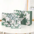 Elegant green floral gift bags featuring birds and silver satin bows in four sizes - Small (18x16x10cm) / Silver Ribbon