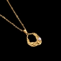 Detailed view of a gold-plated stainless steel necklace with irregular lava pendant and pearl - Irregular Organic Shape Pendant (CYN010-1)