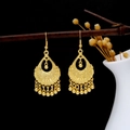 Bohemian gold teardrop earrings with intricate filigree and bell-shaped tassels - E4178 Ethnic Style Teardrop Hollow Beaded