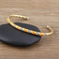 Bohemian 18k gold plated open bangle with orange enamel twist design and zircon accents - Orange