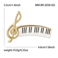Spilla elegante a forma di pianoforte e chiave di violino in oro e smalto, 4,6x3,5 cm - Oro