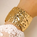 Detailed view of wide gold cuff bracelet with hammered texture and irregular wavy finish - Wavy Undulating Hammered Wide Open Bangle (5114) / Gold