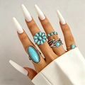 Detailed view of vintage bohemian ring set featuring turquoise stones and leaf motifs. - 5-Piece Vintage Turquoise Series (DZ-138) / Antique Silver