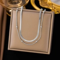 Silver double-layer necklace set with flat snake chain and metallic beads on display - Blade + Round Bead Necklace (H165) / Steel