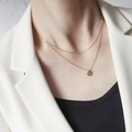 Double-layered 18K gold plated titanium steel necklace with a hexagonal pendant on model - Double Layer Hexagon Pendant Necklace (H680) / Gold