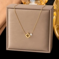 Elegant 18K gold-plated titanium steel necklace with star pendant and white pearl - Square Clover Flower (H364) Gold