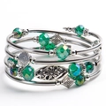 Detail view of multilayer wrap bracelet with green faceted beads and floral metal charms - Dark Green Crystal