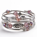 Detailed view of multilayer pink zebra stone wrap bracelet with floral pendant charms - Purple Crystal