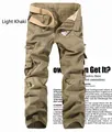 Men's loose cargo pants in khaki yellow with multiple pockets and a woven belt - Khaki