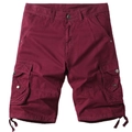 Detail of burgundy cargo shorts showing side flap pockets and sturdy metallic buttons - Burgundy