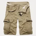 Men's khaki cargo shorts with multi-pocket design and matching canvas belt in classic fit - Khaki