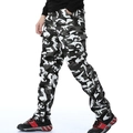 Men's camouflage cargo pants with fleece lining and side pockets in black and grey - EU 29 / Black and White Camouflage