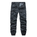 Detail of dark grey cargo jogger pants featuring multi-pockets and elastic drawstring waist - EU 29 / Slate Gray