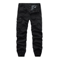 Detail view of black camo cargo joggers featuring multi-pocket design and elastic drawstring waist - Black