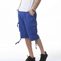 Men's bright blue cargo shorts with large side pockets and drawstring hem details - EU 31 / Royal Blue