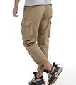 Men's khaki loose cargo pants with side flap pockets and cuffed hem in casual style - EU 29 / Khaki