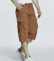 Men's loose cargo shorts in terracotta red featuring multiple functional utility pockets - EU 38 / Earthy Yellow