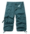 Detail of teal cargo shorts featuring large side pockets with strap and buckle accents - Lake Blue