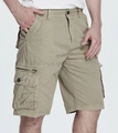 Detailed view of khaki cargo shorts featuring multiple pockets and durable cotton fabric - EU 30 / Khaki