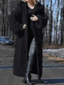 Detail view of a long black hooded cable-knit cardigan with a thick textured weave pattern - S / Black