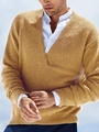 Detailed close-up of mustard yellow waffle knit texture and ribbed hem on men's V-neck sweater - S / Apricot