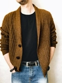 Detail view of coffee-brown chunky knit cardigan with large buttons and textured fabric - Brown