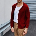 Detailed view of the dark red waffle knit texture and traditional button closure on the cardigan - S / Burgundy