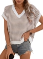 Detailed close-up of houndstooth knit vest featuring a V-neck and ribbed edges - S / Brown and White