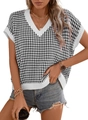 Close-up of black and white houndstooth knit vest with deep V-neck and ribbed trim - S / Black & White