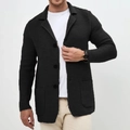 Détail du cardigan en maille gris foncé avec col à revers et texture gaufrée - Noir