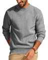 Close-up detail of grey crew neck waffle knit sweater with textured fabric and ribbed cuffs - Gray