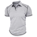 Detailed view of grey polo shirt with black contrast piping on collar and sleeve seams - Light Gray