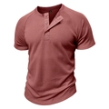 Detail of waffle knit fabric and three-button neckline on brick red men's Henley shirt - Rust Red