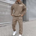 Outdoor street shot of khaki hoodie and joggers set with white NEW YORK U.S.A print - WTA16 / S