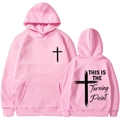 Pink unisex hoodie with cross graphics and This is the Turning Point back print - Pink