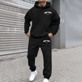 Close-up of New York U.S.A. white letter print on black drawstring hoodie and joggers - Arch Letter Black