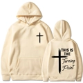 Unisex beige hoodie featuring black cross graphics and This is the Turning Point text - Khaki