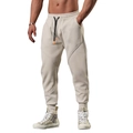 Detail view of beige joggers featuring heavy knit fabric and unique curved panel stitching - M / Bottom (18A-224裤子) / Apricot