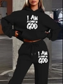 Dettaglio della tuta in pile nera con stampa di lettere bianche I AM A CHILD OF GOD - S / Nero