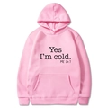 Detailed close-up of pink hoodie with Yes I'm cold text and kangaroo pocket - S / Pink