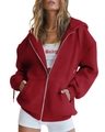 Close-up of deep red oversized zip-up hoodie featuring ribbed cuffs and large pockets - S / Red