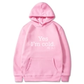 Pink hooded sweatshirt for men and women featuring Yes I'm Cold 24:7 white text print - S / Pink with White Print