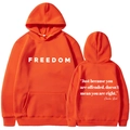 Leuchtend oranger Unisex-Kapuzenpulli mit weißem Freedom-Slogan und bequemem Fleece-Stoff - S / Orange