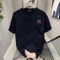 T-shirt noir en coton avec broderie lettre M marron et coupe décontractée oversize - S / Noir