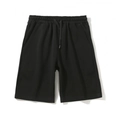 Women's black loose sport shorts with elastic drawstring waist and side pockets - Black